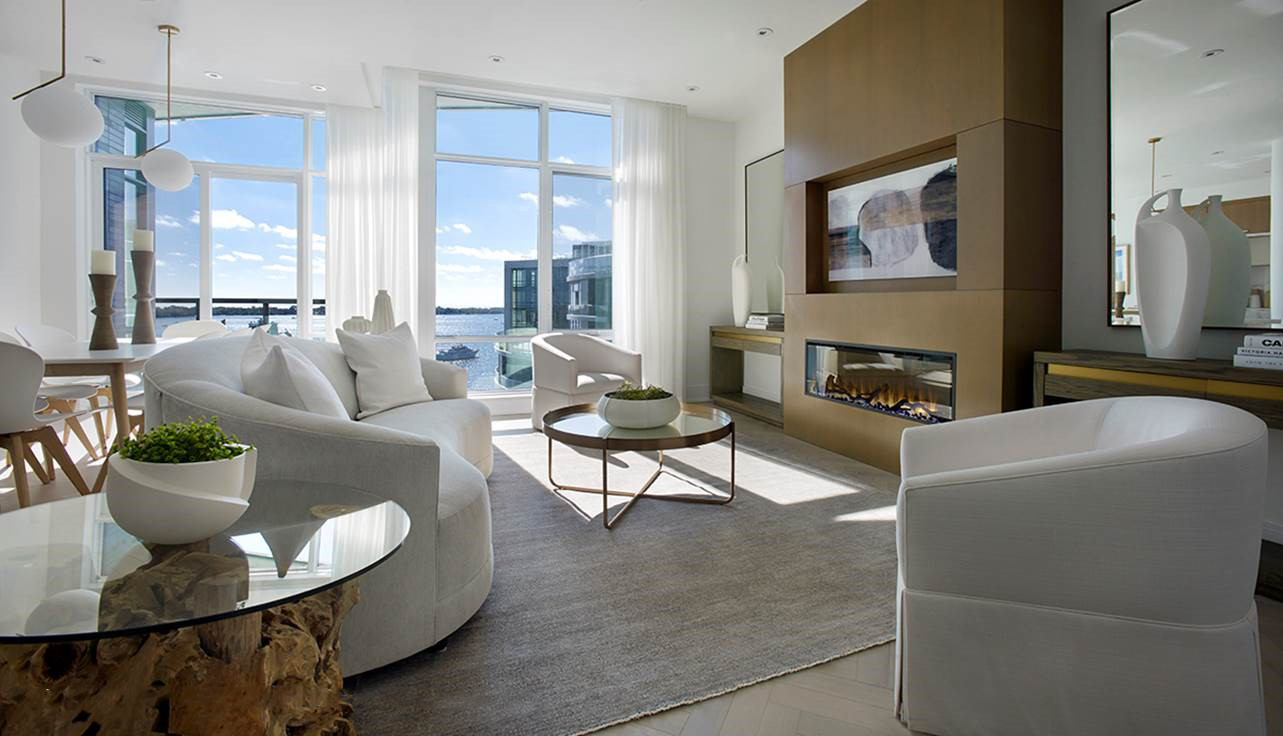 Floor-to-ceiling windows fill Aquavista's sky penthouse suite with natural light
